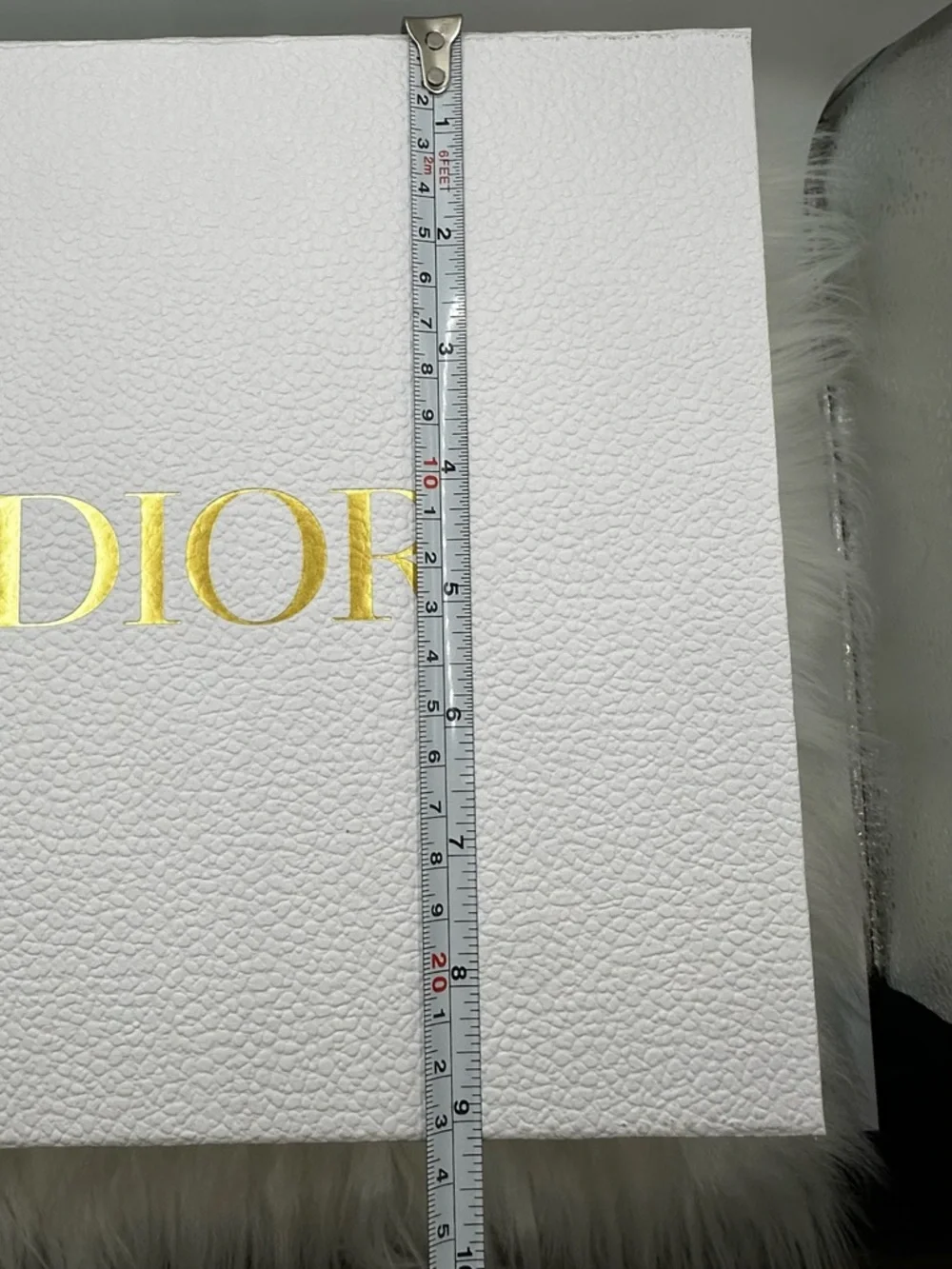 Dior White Gift Box with Gold Logo and protective wrapping inside